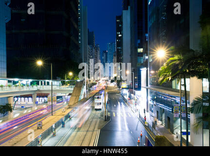 Hong Kong - 22 February, 2014: Famous double-deck tram stopped at the tram stop on the Arsenal Street of the Central district, Hong Kong Stock Photo
