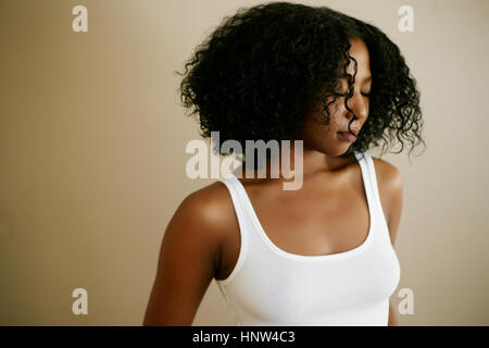 Portrait of confident women leaning on wall Stock Photo