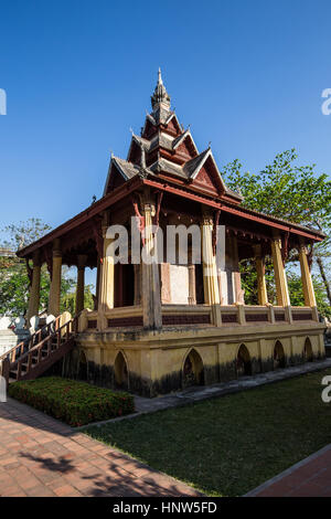 Wat Si Saket located is famous for its cloister wall housing thousands of tiny Buddha images and rows of hundreds of seated Buddhas.  They come in all Stock Photo