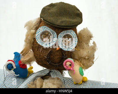 Coconut head on a straw man in the competition at the Anglesey Show Stock Photo