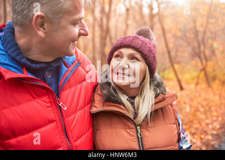 Mature couple walking outdoors, in autumn Stock Photo