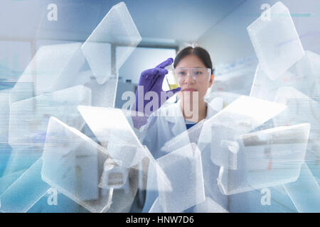 Composite image of scientist inspecting modified crystal shape material in crystal engineering research laboratory