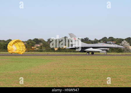 Royal Norwegian Air Force F-16AM dropping it's brake chute after landing at North Weald Airfield in Essex for a WWII veterans reunion. Stock Photo