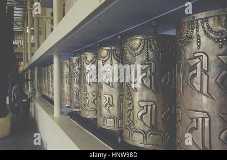 Tibetan prayer wheels at Dalai Lama's Monestary, India Stock Photo