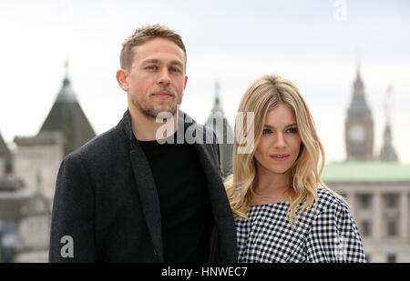 Charlie Hunnam and Sienna Miller attending 'The Lost City Of Z' Photocall at The Corinthia Hotel, London. Stock Photo