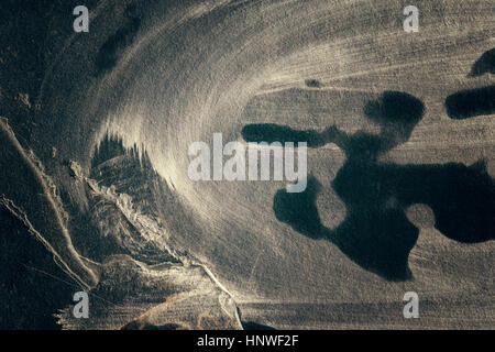 Dark grungy slate background or texture, color toned applied. Stock Photo