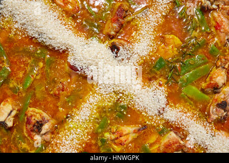 Paella from Spain recipe process ad the rice step by step Stock Photo