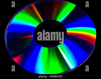 the light reflected from a CD is a collection of psychedelic colors Stock Photo