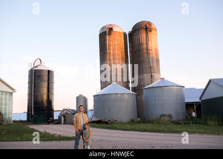 Portrait of father and daughter on farm Stock Photo