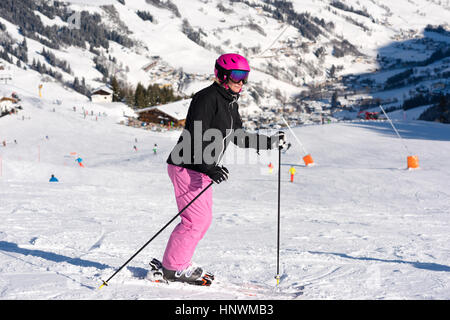 Female skier in ski area Stock Photo
