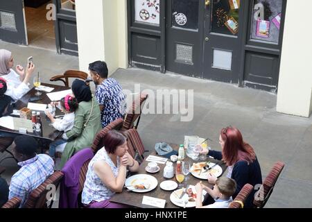 Covent Garden London England, United Kingdom - August 16, 2016:  People enjoying meal at Covent Garden Restaurant Stock Photo