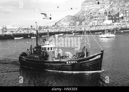 The trawler 'Wakeful KY 261' entering Whitby Harbour in 1966 Stock Photo