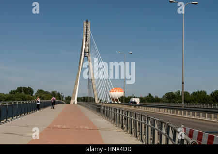 Most Świętokrzyski. ( Świętokrzyski Bridge- Holy Cross Bridge) spanning  the Vistula river in Warsaw, Poland. It was constructed in 2000 AD Stock Photo