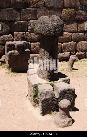 Peru – Inca prehistoric ruins in Chucuito near Puno, Titicaca lake area. This photo present stone phallus in temple de la Fertilidad Stock Photo