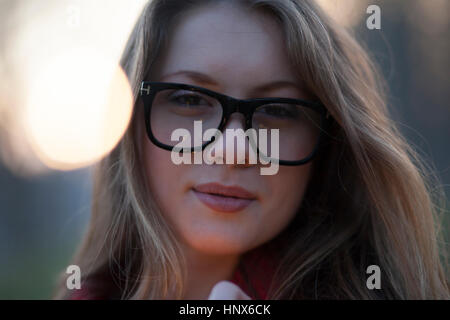 Portrait of young woman wearing spectacles Stock Photo