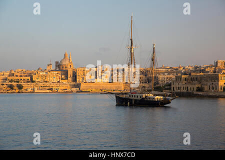 Fishing boat on water, Valletta, Malta Stock Photo