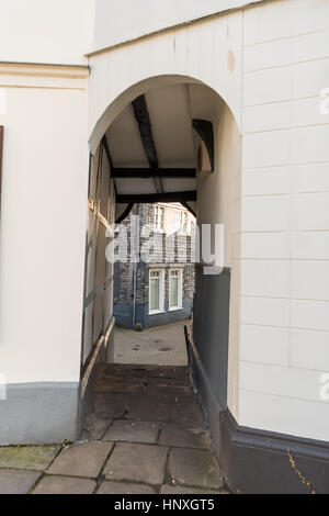HATTINGEN, GERMANY - FEBRUARY 15, 2017: When walking through the old town one can discover small archways that connect the lanes Stock Photo