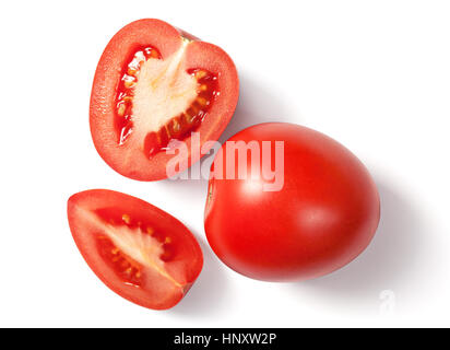 Fresh plum tomatoes on white background with natural shadow. Top view Stock Photo