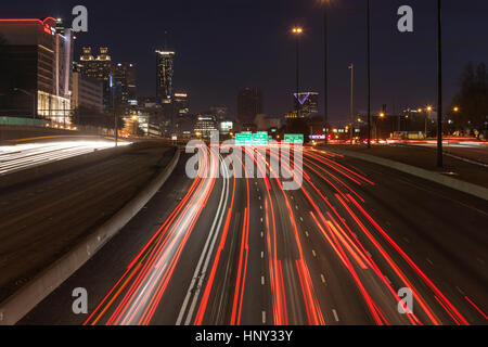 Atlanta, Georgia, USA - February 15, 2014: Editorial night view of Atlanta's massive Interstate 75 and 85 freeways through downtown. Stock Photo