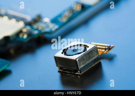 Cell phone camera module with other parts of device, selective focus, service and repair concept Stock Photo