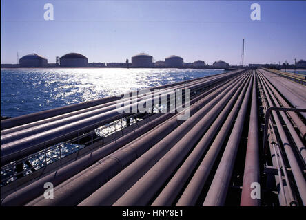 RAS TANURA, SAUDI ARABIA -- PIPES LEADING TO THE OIL LOADING TERMINAL FOR THE SUPERTANKERS AT THE  WORLD'S LARGEST OIL REFINERY AT RAS TANURA, SAUDI ARABIA. Stock Photo