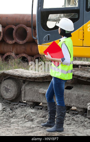 Woman engineer on a construction site, Selective focus and small depth of field Stock Photo