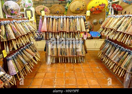 KAOHSIUNG, TAIWAN -- JULY 24, 2016: A shop sells hand-painted oil-paper umbrellas, which are traditional art and craft products by the Chinese Hakka p Stock Photo