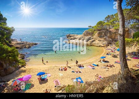 Tourists on the Costa Brava Beach, Spain Stock Photo