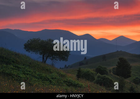 Ukraine. Carpathians. Dzembronya. Sunset sky in the mountains Kosarische Stock Photo