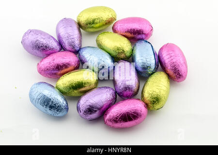 Multi-coloured foil covered chocolate Easter eggs Stock Photo