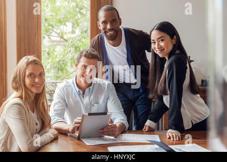Team of professionals in casual office, portrait Stock Photo