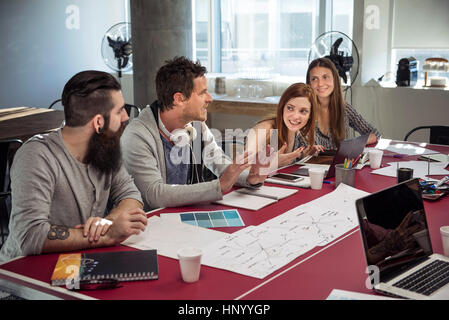 Creative professionals in casual meeting Stock Photo