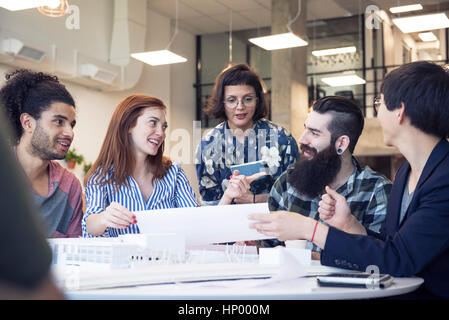 College students collaborating on project Stock Photo