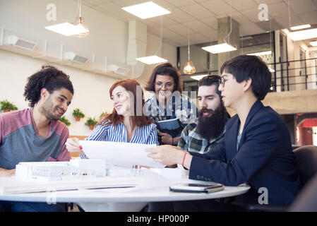 Aspiring architects working on project together Stock Photo