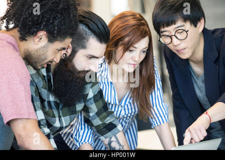 Colleagues working together on project Stock Photo