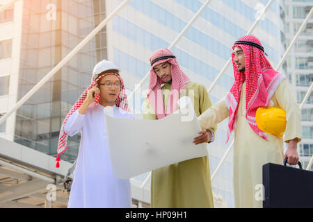 Arab Business people having consultanting about new project with city background. Stock Photo