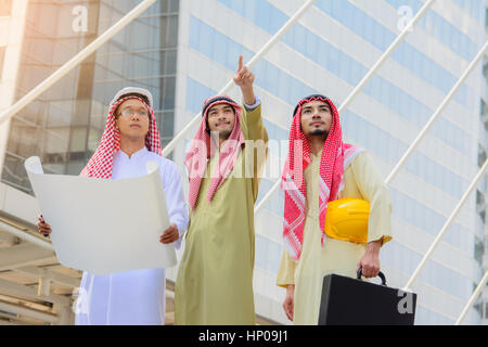 Arab Business people having consultanting about new project with city background. Stock Photo