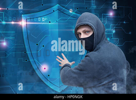 hacker breaking cyber security protection Stock Photo