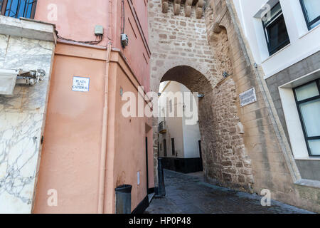 CADIZ,SPAIN-NOVEMBER 14,2016: Old medieval wall, Arch, Arco de la Rosa, close to cathedral, Cadiz, Andalucia. Stock Photo