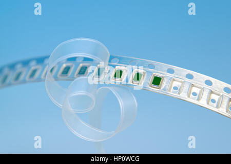 Surface mount components on a carrier tape Stock Photo