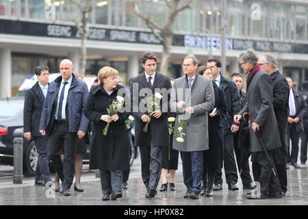 Berlin, Germany. 17th Feb, 2017. Federal Chancellor Merkel and the Canadian Prime Minister Justin Trudeau visit together the poster place on Breitscheid in Berlin and think of the victims of the poster on the 19th of December, 2016. They lay down flowers. Credit: Simone Kuhlmey/Pacific Press/Alamy Live News Stock Photo