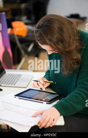 Architect using digital tablet to prepare design Stock Photo