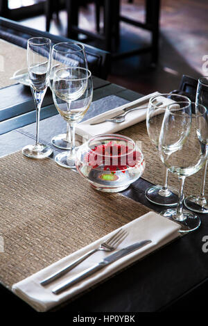 Place settings in restaurant Stock Photo