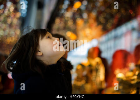 Little girl window shopping