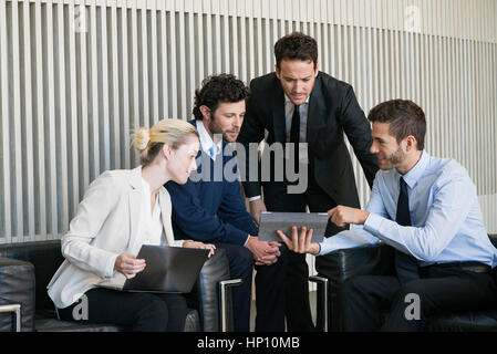Business team members collaborating Stock Photo