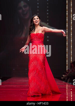 New York, NY USA - February 9, 2017: Diane Guerrero in Gustavo Cadile walks runway for the Red Dress Collection 2017 fashion show by Macys at Hammerstein Ballroom at Manhattan Center benefit American Heart Association Stock Photo