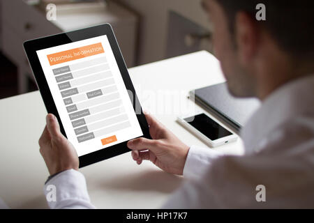 bussinessman at office looking an online petition on a web. All screen graphics are made up. Stock Photo