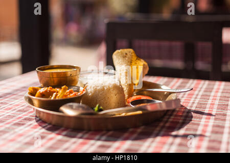 Vegetarian Nepali Thali (Dal Bhat) set, the traditional dinner dish of Nepal Stock Photo