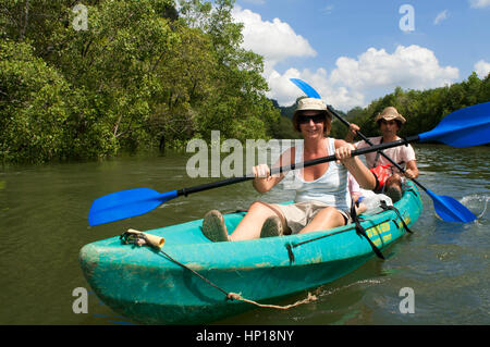 People enjoy kayak padding through the mangrove forest and sea cave. SEAKAYAK BOR THOR. Krabi. Thailand. Asia. The north part of Krabi province boasts Stock Photo