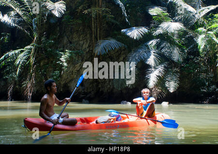 People enjoy kayak padding through the mangrove forest and sea cave. SEAKAYAK BOR THOR. Krabi. Thailand. Asia. The north part of Krabi province boasts Stock Photo